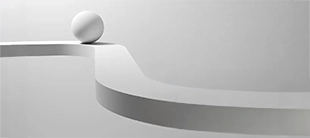 Sphere poised on a curved ramp, representing the Designing Scalable Solutions course
