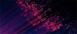 Converging streaks of light symbolizing the AI-Driven Leadership course